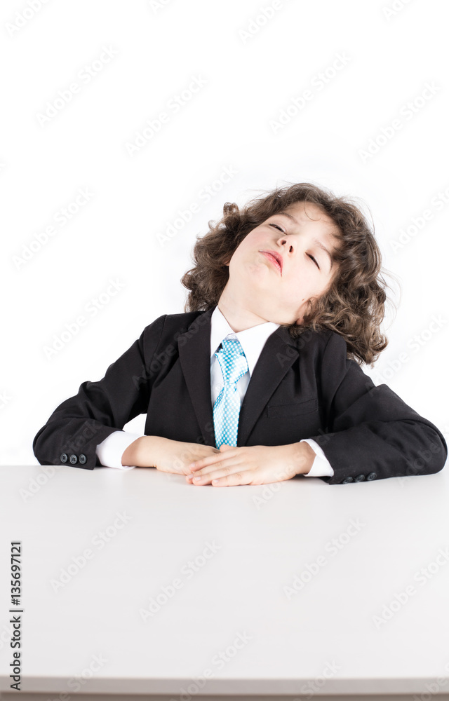 Little curly manager in a business suit sitting at a desk sleeping, his head thrown back. White background. Little curly manager in a business suit sitting at a desk sleeping, his head thrown back. White background.
