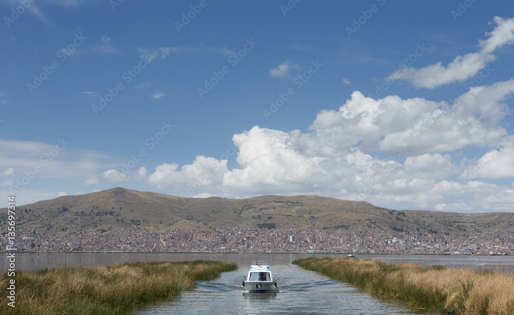 Puno Peru Lake Titicaca. Uros floating islands.  Boat.