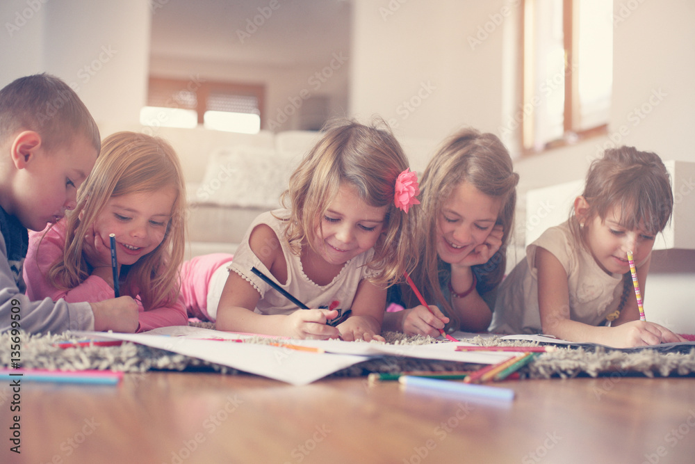 Large group of children lying on the floor. Large group of children lying on the floor.