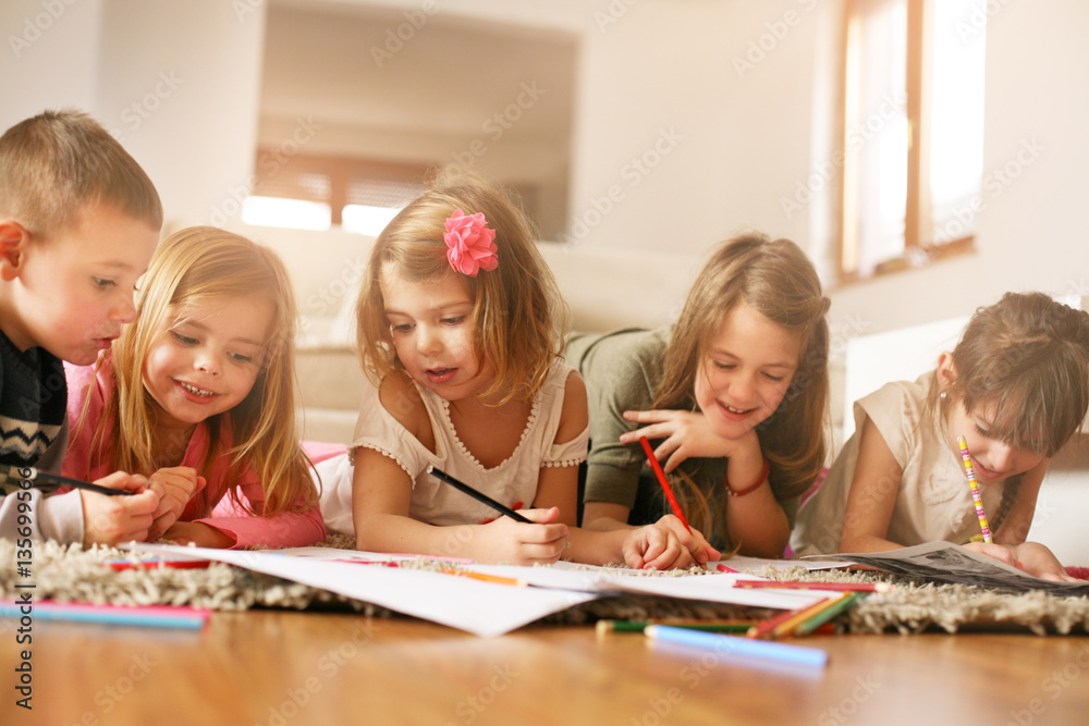 Large group of children lying on the floor. Large group of children lying on the floor.