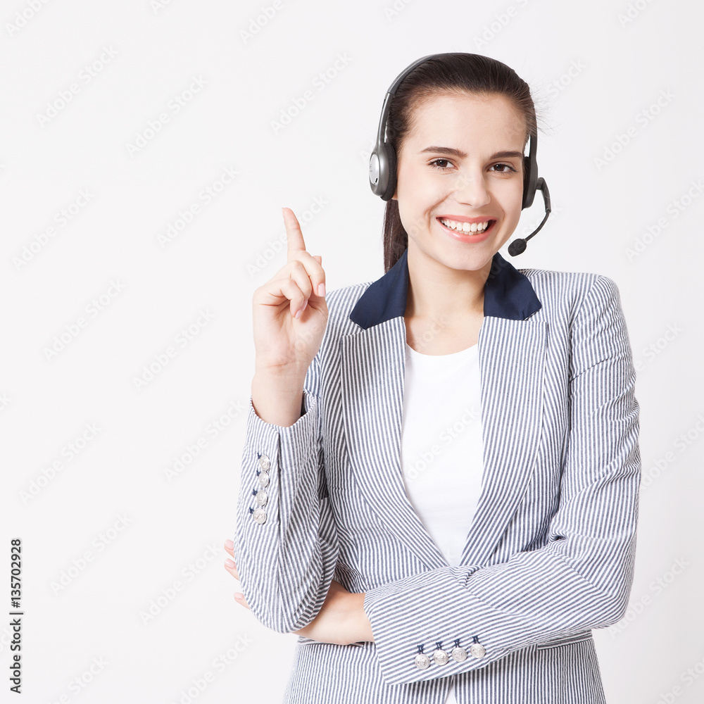 Female customer support operator with headset and smiling Female customer support operator with headset and smiling