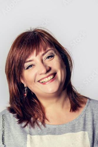 Portrait of a beautiful laughing woman. © lizavetta