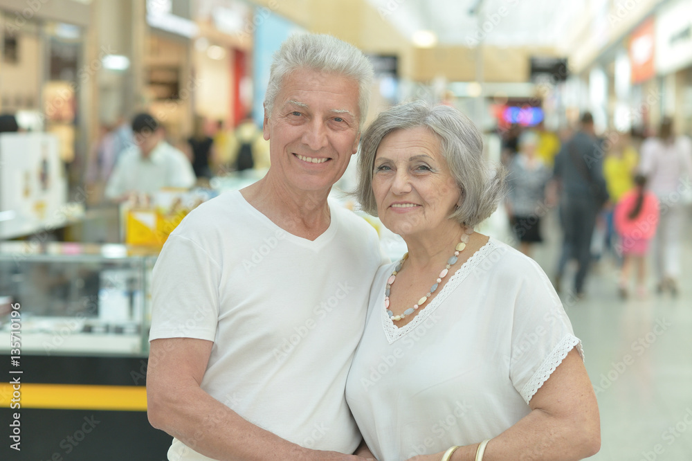 Portrait of beautiful elderly couple in shopping mall Portrait of beautiful elderly couple in shopping mall