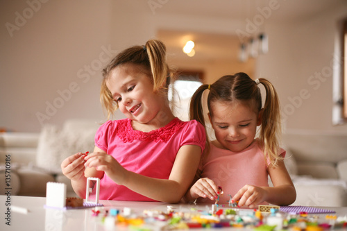 Girls playing at home.
