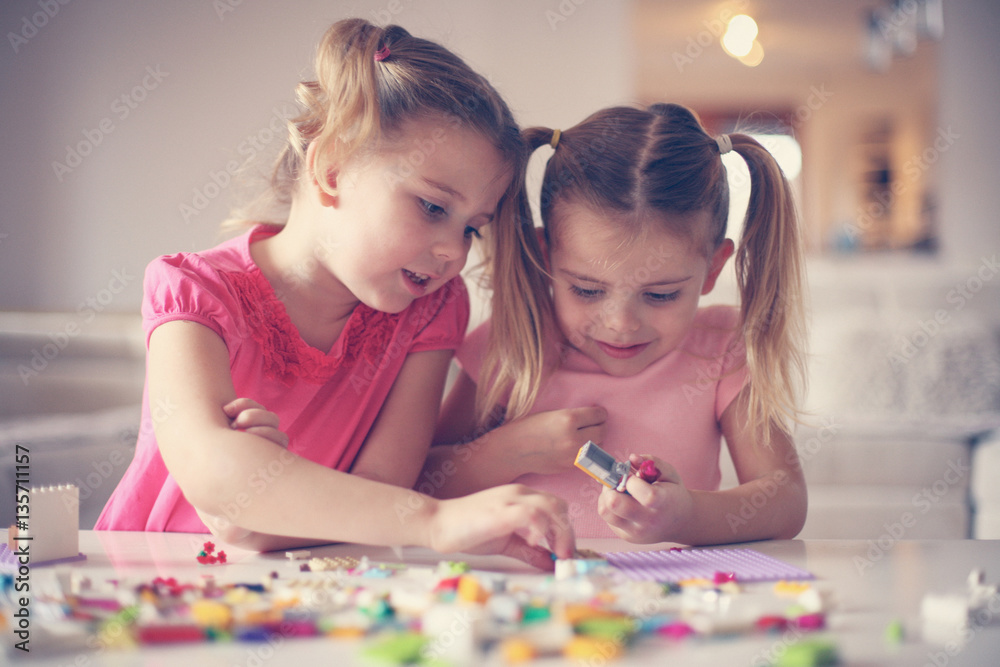 Fototapeta premium Girls playing at home.