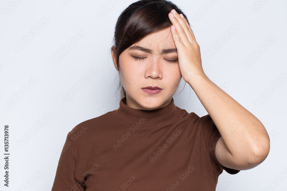 Woman has headache Woman has headache