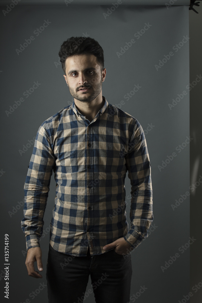 Caucasian boy isolated on grey background