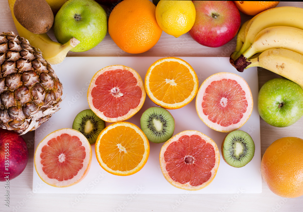 Tropical fruit on white board Tropical fruit on white board