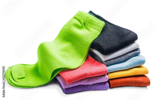 different color socks isolated on white background photo