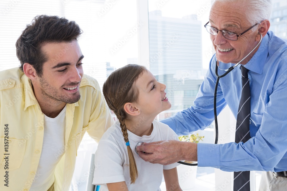 Fototapeta premium Doctor examining the patient