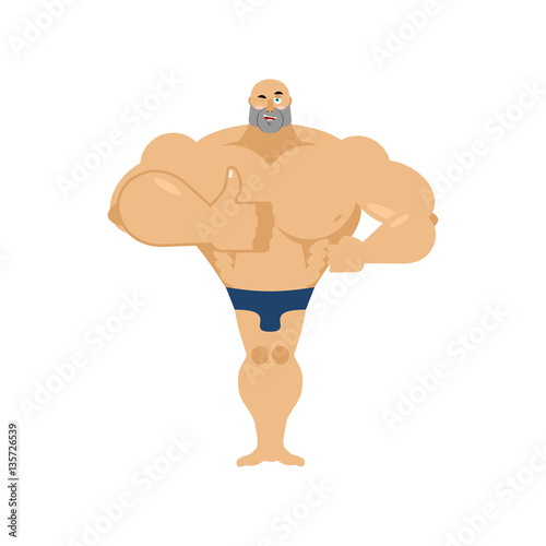 Athlete winks and thumbs up. Happy bodybuilder. merry sportsman