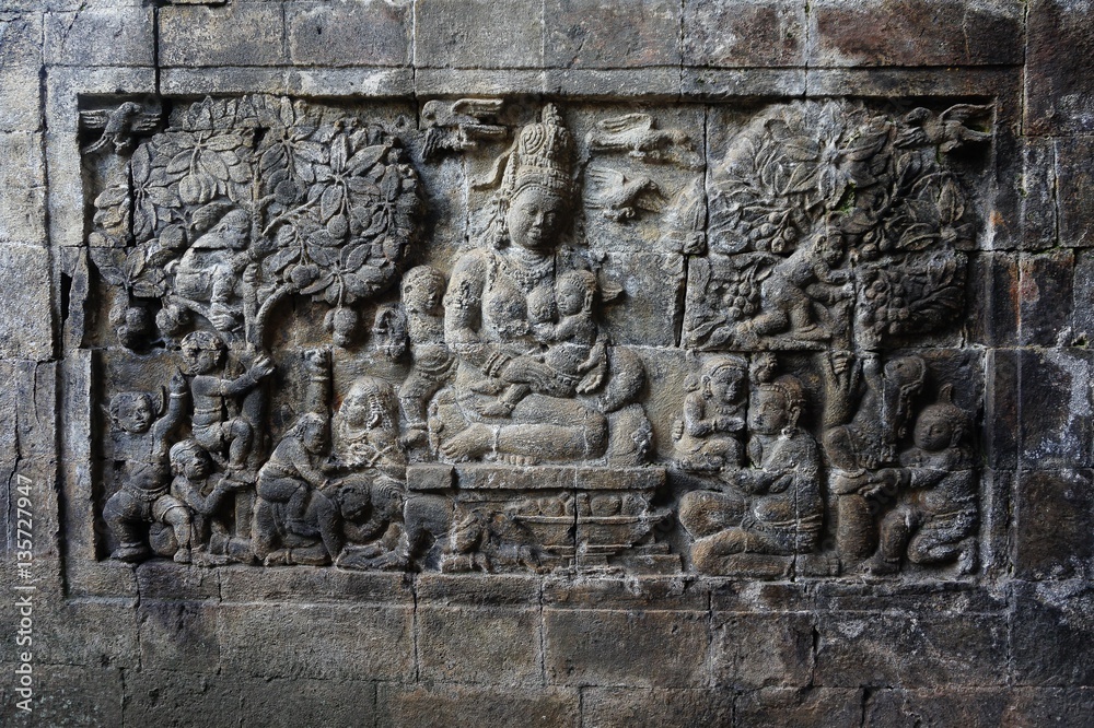 relief sculpture on the wall of a Buddhist temple in indonesia