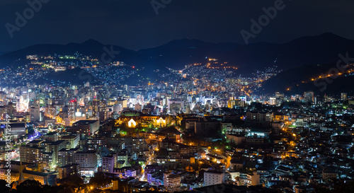 Nagasaki cityscape in Japan at night © leungchopan