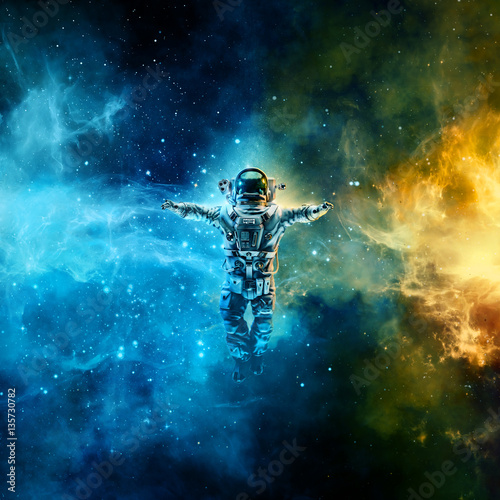 Astronaut in space / 3D illustration of astronaut floating in space between glowing galaxies
