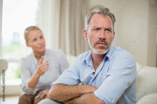 Couple having an argument in living room