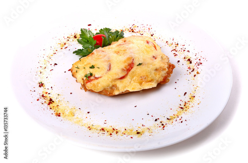 Fried meat covered with cheese and eggs