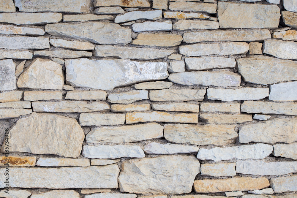 Stone wall. Outdoor background natural stone - sandstone