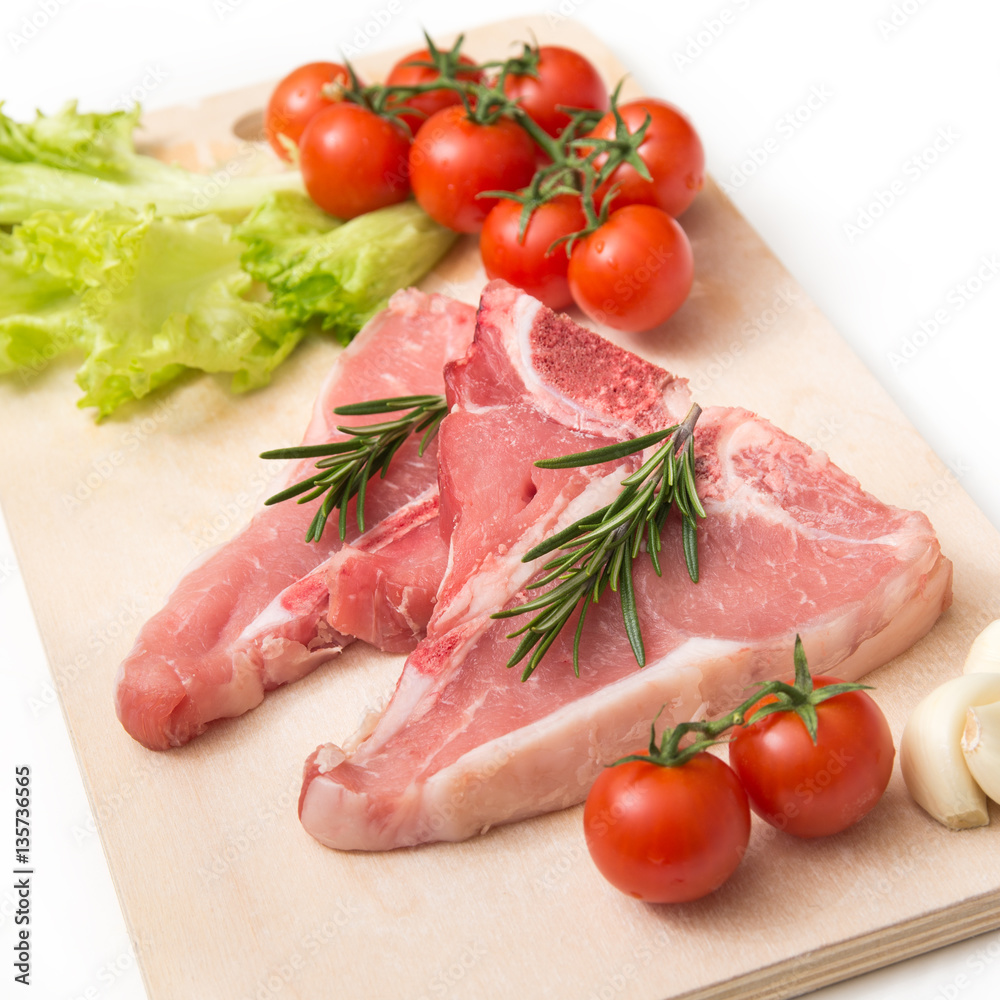 Fresh beef steaks with vegetables