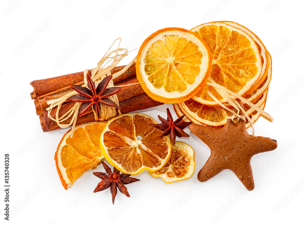 Dried oranges, star anise, cinnamon sticks and gingerbread, isolated on white background Dried oranges, star anise, cinnamon sticks and gingerbread, isolated on white background