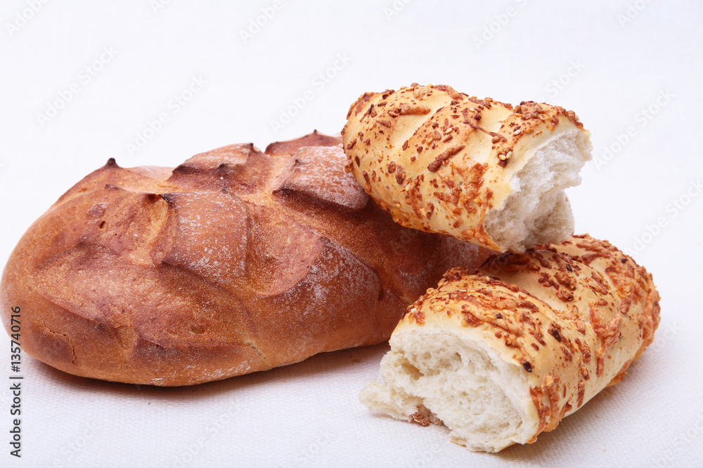 assorted breads isolated on a white background.