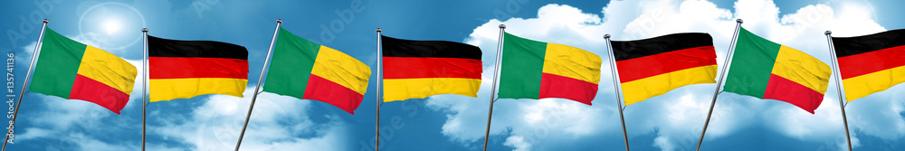 Benin flag with Germany flag, 3D rendering Benin flag with Germany flag, 3D rendering