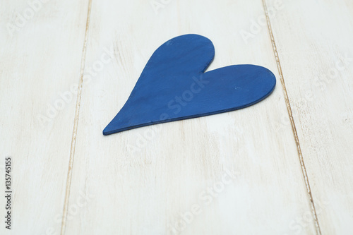  blue heart on a white background, wood painted  Greek blue in v photo