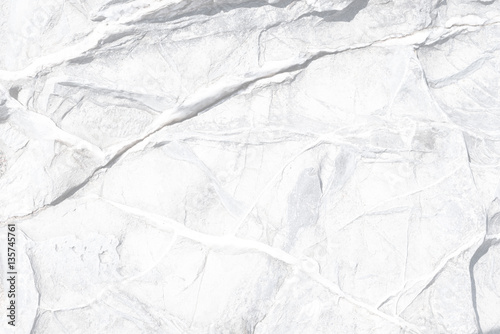 Natural texture of white with a pattern of fractures