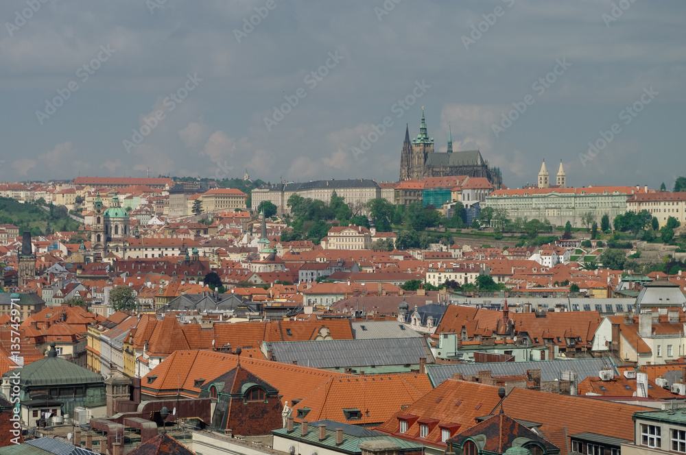 View from above to tiled roofs of old town, panorama of Prague, Czech republic