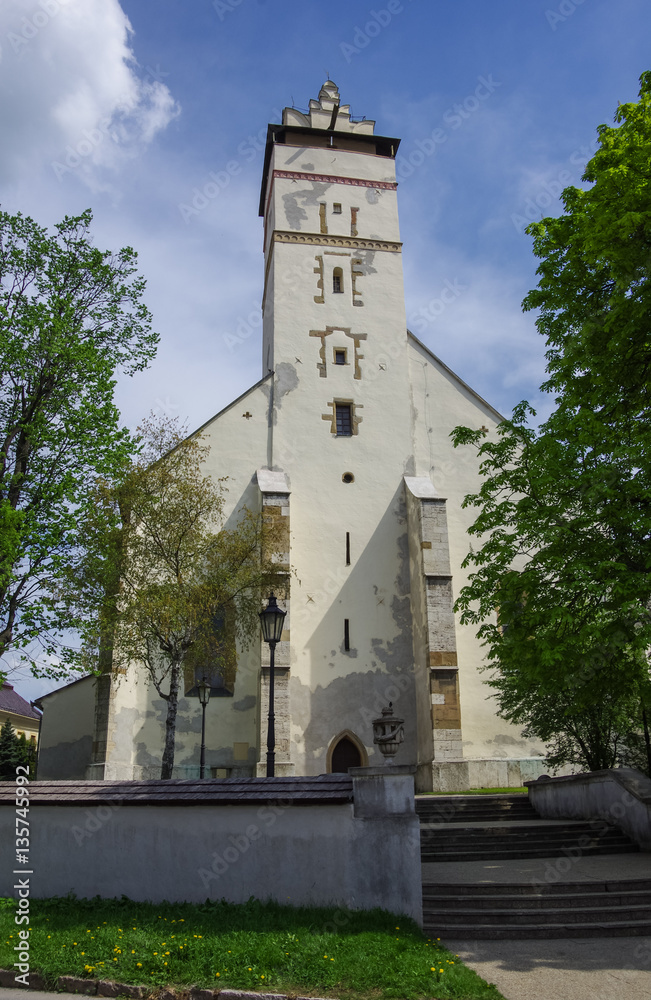 Naklejka premium Kezmarok, Slovakia - Medieval basilica of the Holy Cross - bell tower