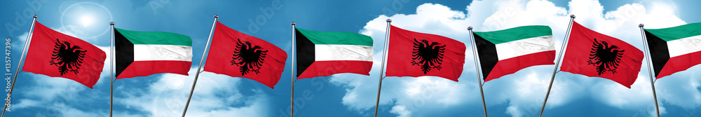 Albania flag with Kuwait flag, 3D rendering Albania flag with Kuwait flag, 3D rendering