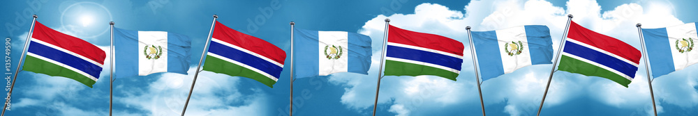 Gambia flag with Guatemala flag, 3D rendering Gambia flag with Guatemala flag, 3D rendering