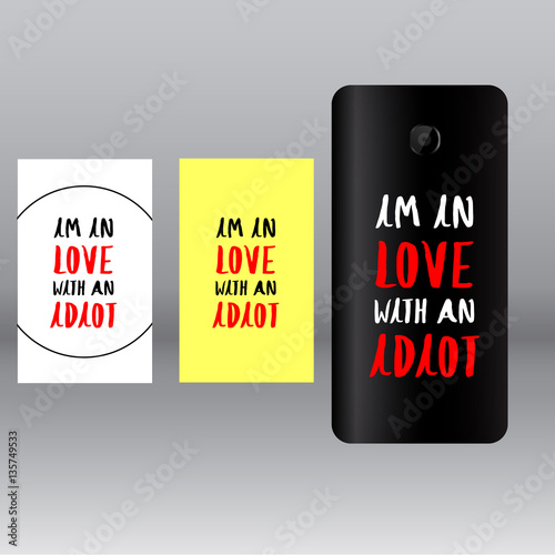 colored stickers for mobile phone with inscription i am in love with an idiot on grey background 