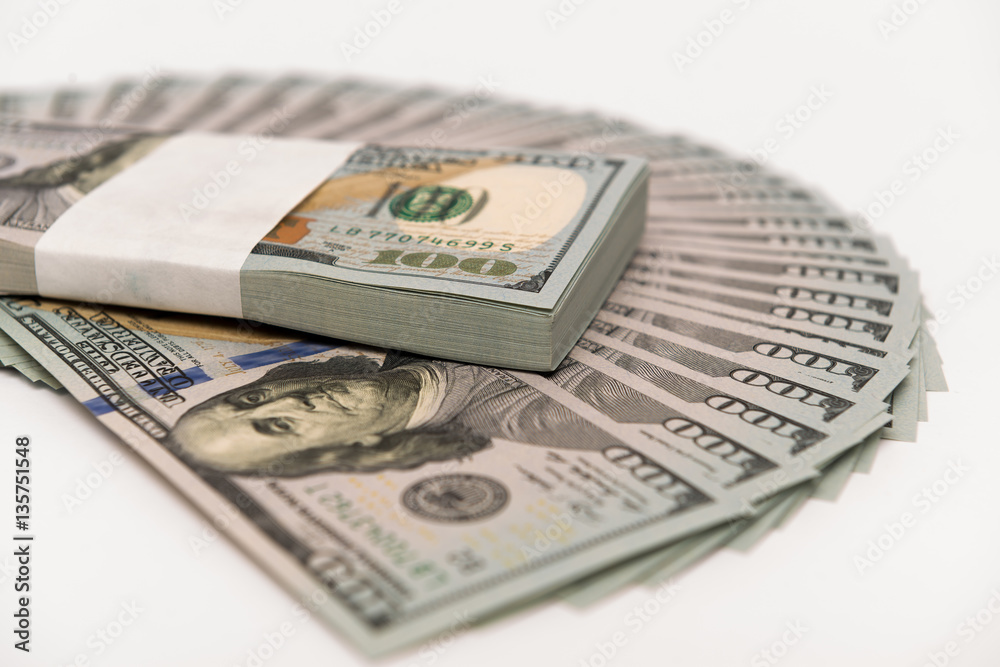 Stack of money in US dollars cash banknotes Stack of money in US dollars cash banknotes