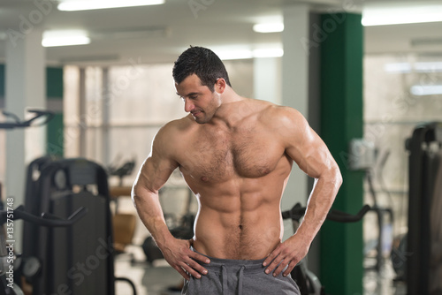 Hairy Man Flexing Muscles