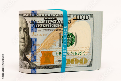 Stack of money in US dollars cash banknotes