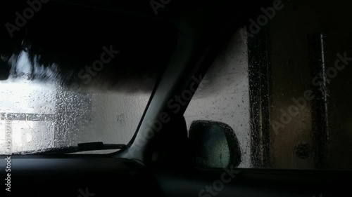 car in the automatic, contactless car wash, washing, cleaning photo