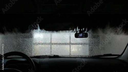 car in the automatic, contactless car wash, washing, cleaning photo