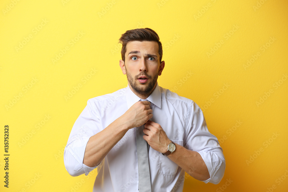 Young man posing on yellow background Young man posing on yellow background