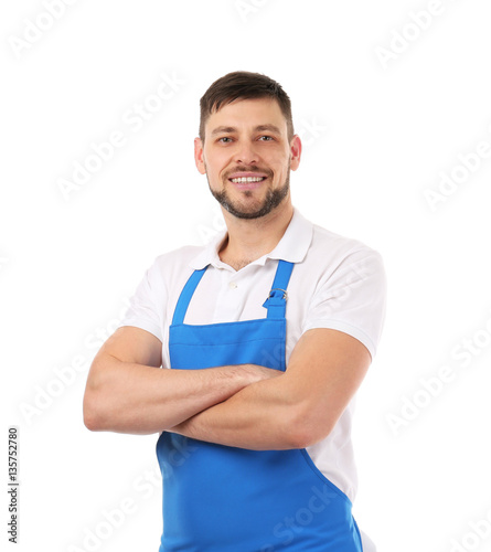 Handsome man in blue apron ...
