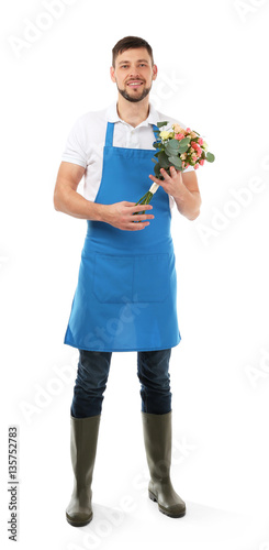 Male florist holding flower...