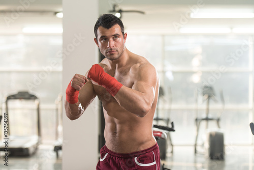 Portrait of a MMA Fighter in Health Club