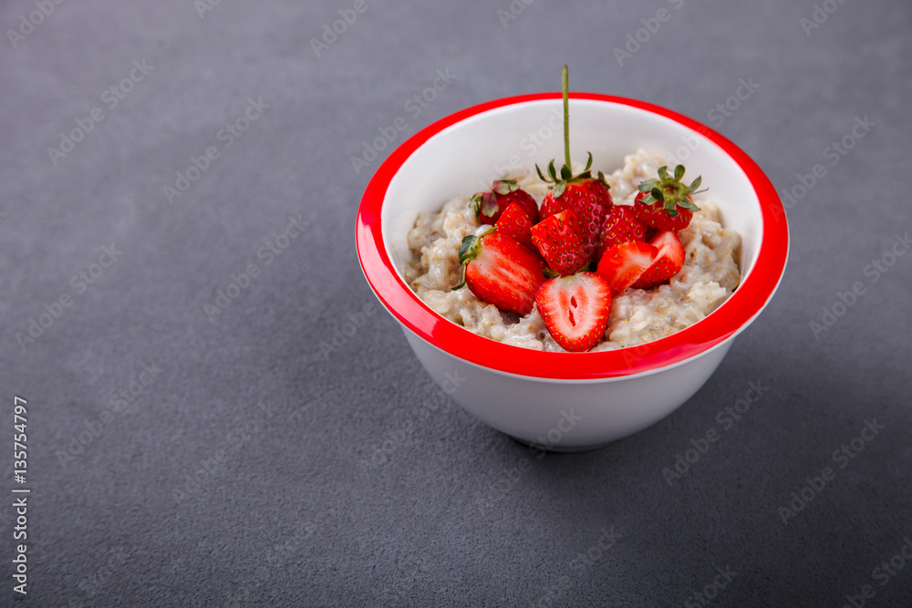 Oatmeal Porridge with fresh Berries,Strawberry.Breakfast.Concept of Healthy Eating. Copy space.selective focus. Oatmeal Porridge with fresh Berries,Strawberry.Breakfast.Concept of Healthy Eating. Copy space.selective focus.
