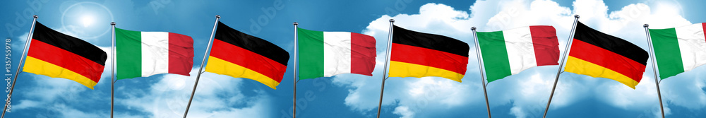 German flag with Italy flag, 3D rendering German flag with Italy flag, 3D rendering