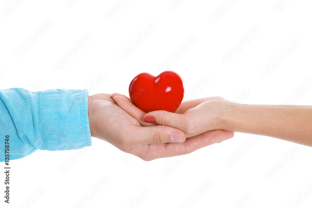 Couple hands with red heart on white background
