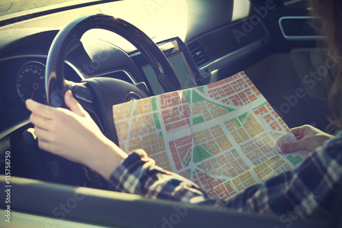 Female driver searching dir...