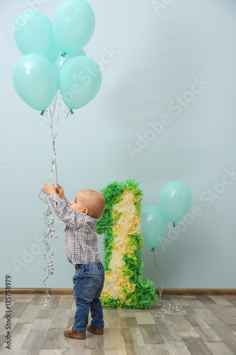 Cute baby boy with birthday...