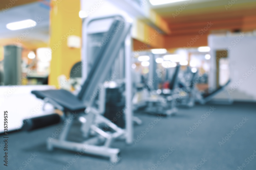 Blurred view of gym interior with equipment Blurred view of gym interior with equipment