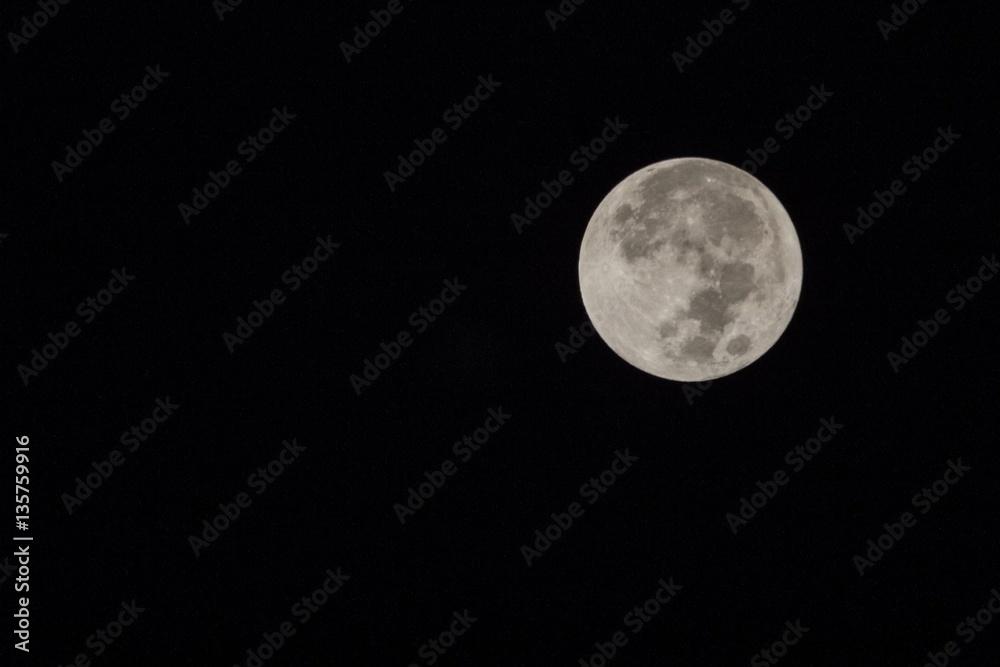 Blur moon with isolated black sky background for text adding