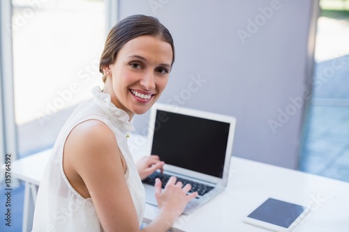 Beautiful woman using laptop