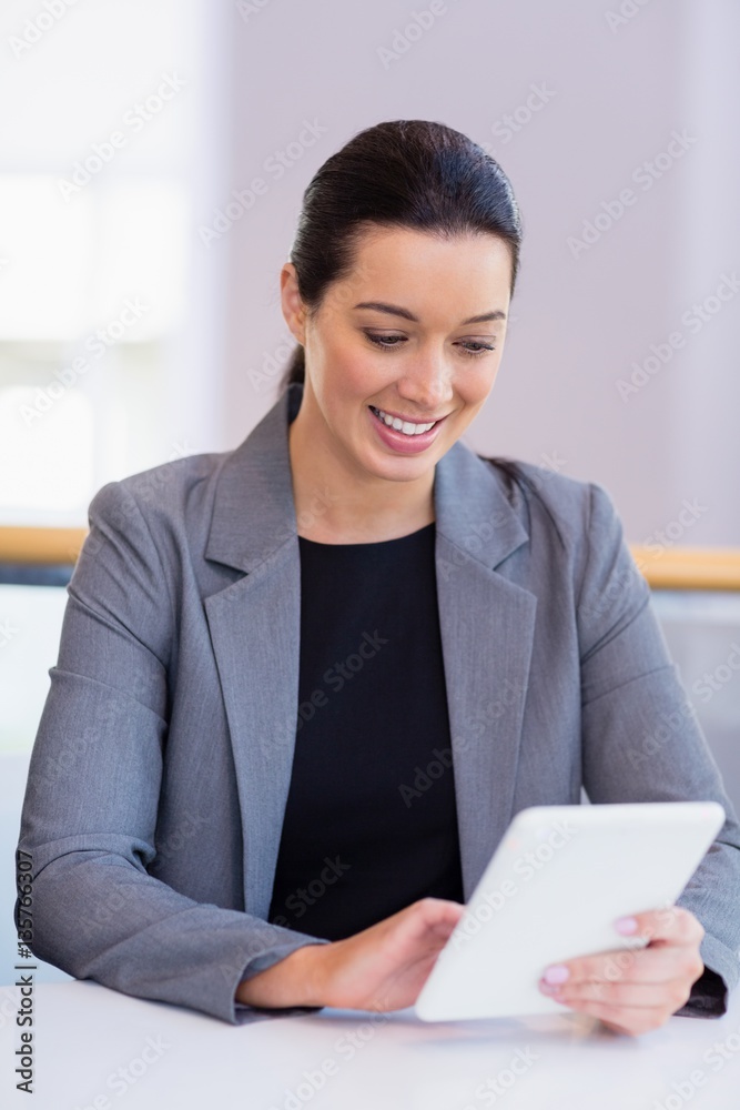 Businesswoman using digital tablet Businesswoman using digital tablet